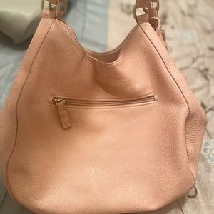 Beautiful pink purse in very good condition.